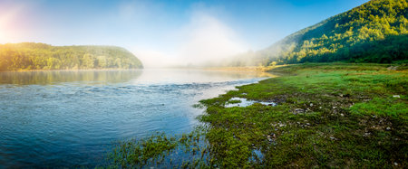 Calm morning scene in summer on the Dniester river. Location place Dnister canyon of Ukraine, Europe. picturesque photo wallpaper. nature photography. world landmarks. Discover the beauty of earth.の写真素材