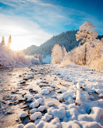Breathtaking image of a mountain river in the evening light. Carpathian mountains, Ukraine, Europe. Exotic wallpapers. Fabulous photo of Happy New Year. Splendid christmas scene. Beauty of earth.の写真素材