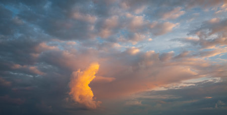 An epic sunset with colorful clouds lit by the sun. Photo of textured sky. Scenic image of dramatic light in summer weather. breathtaking natural wallpaper background. Discover the beauty of earth.の写真素材