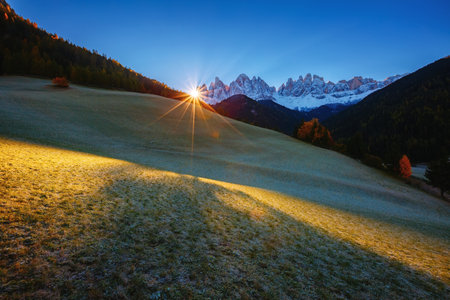 Autumn morning in St. Magdalena village with Odle range. Location Val di Funes (Villnob), Dolomite alps, Trentino-Alto Adige, Italy, Europe. Fantastic photo wallpaper. Discover the beauty of earth.の写真素材