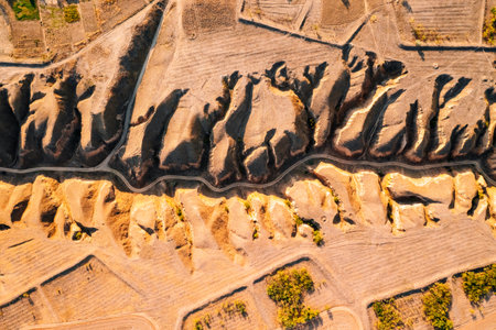 Spectacular topography created by soil erosion, Stanislav Grand Canyon. Location place Ukraine, Europe. Aerial photography, drone shot. Image from a bird's eye view. Discover the beauty of earth.の写真素材