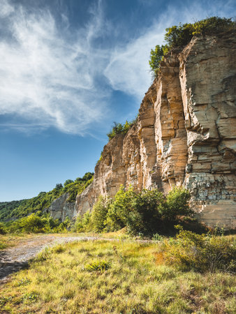 View of the natural wall made of limestone. Location place Dniester canyon national park, Ukraine, Europe. Geological outcrops of Silurian sandstones. Photo wallpaper Discover the beauty of earth.の写真素材