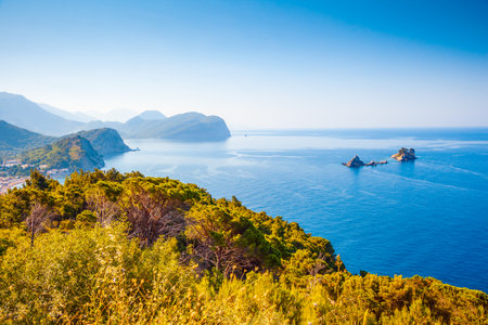 Picturesque summer view of the seascape Adriatic Sea on a sunny day. Location Montenegro, Balkans, Europe. Summer trip to exotic places. Perfect photo wallpaper. Discover the beauty of earth.の写真素材