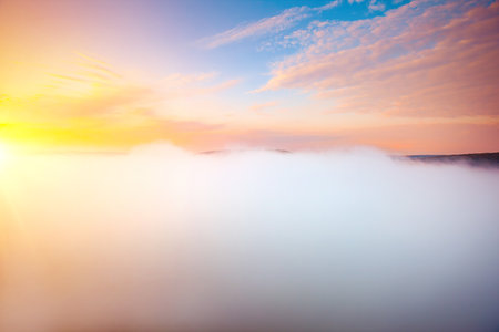 Majestic morning scene of a valley covered with thick fog. Location place Carpathian mountains, Ukraine, Europe. Vibrant photo wallpaper. Spectacular summer picture. Discover the beauty of earth.の写真素材