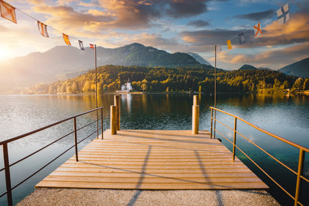 Spectacular view from a wooden pier on the calm lake Grundlsee. Location place resort Grundlsee, Liezen District of Styria, Austria, Europe. Vibrant photo wallpaper. Discover the beauty of earth.の写真素材