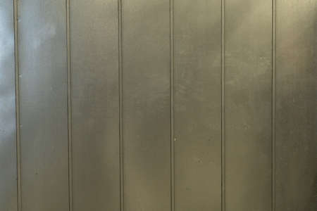 empty background of corrugated iron showing texture with copy space or space for textの写真素材