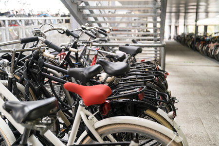 Many parked bikes in a storage with perspective viewのeditorial素材