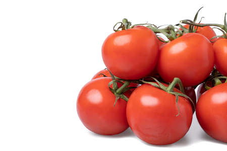 Realistic looking tomatoes isolated white backgroundの写真素材