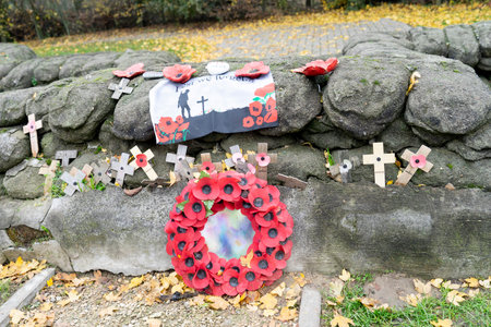 Lest we forget - Remembrance poppies and wreath symbol of the first World War WWI at old trenches...