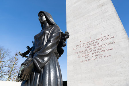 Netherlands,Limburg,Margraten, february 12 2022: The Memorial tower at the American Cemetery and Memorial in Margraten,the Netherlands, the statue portrays a mourning motherのeditorial素材