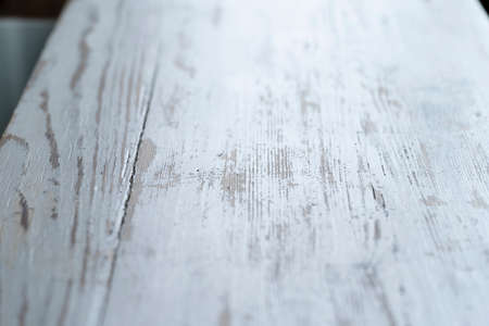 A Full Frame Shot Of rustic weathered Wooden table with shallow depth of field, surface or panel for background pattern top viewの写真素材
