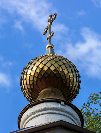 Golden dome of the Church of Epiphany in the village Perhovo, Russia.の写真素材