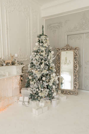 New Years interior with decorated Christmas treeの写真素材