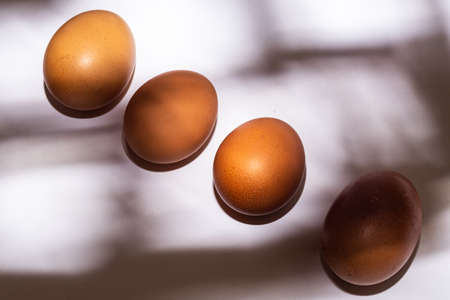 eggs on a white table in the kitchenの写真素材