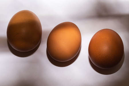 eggs on a white table in the kitchenの写真素材