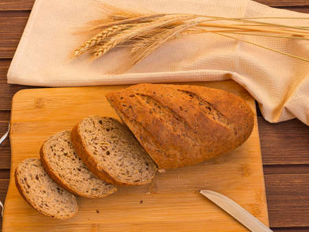 sliced bread on a wooden board morningの写真素材