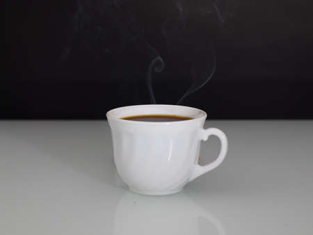 hot coffee steam on a dark background copy spaceの写真素材
