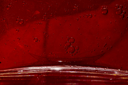 Abstract art with bubbles created with oil and waterの写真素材