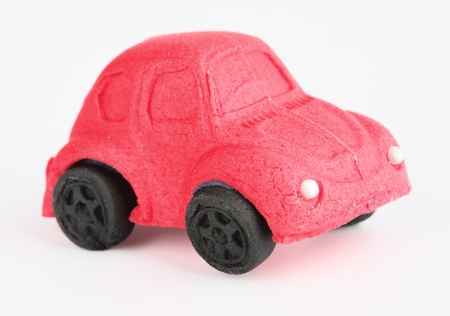 Toy car of caramel, isolated on a white background. の写真素材