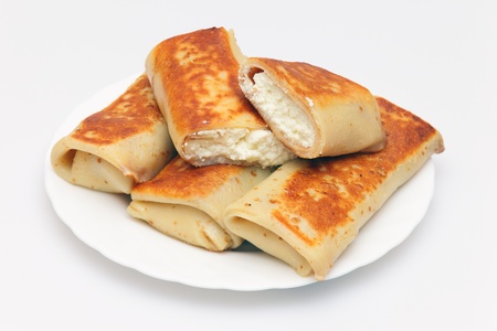 Pile of fritters with cottage cheese on a plateの写真素材