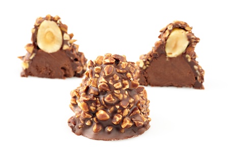 truffle with whole nut in nut crumbs covered on a white backgroundの写真素材
