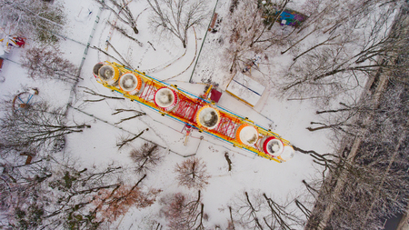 Ferris wheel in the central park of the city in winter. Top view.の写真素材