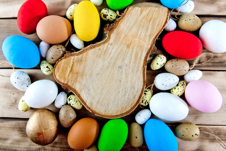 Colored easter eggs background with copy space.の写真素材