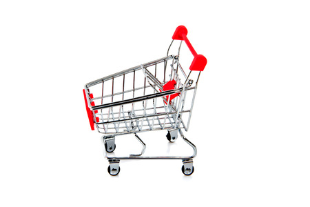 Empty red shopping cart isolated on white background.の写真素材