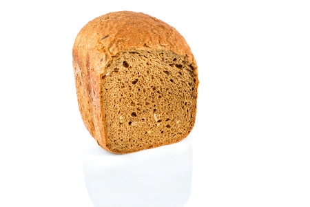 Fresh bread slice isolated on white background. Selective focus.の写真素材