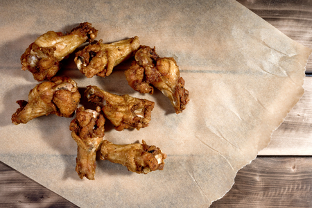 Bbq chicken wings on parchment paper.の写真素材