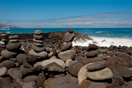 Stack of stones on the sea beach.の写真素材