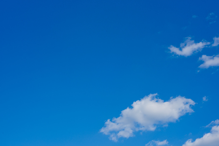 Blue sky background with clouds. Wallpaper.の写真素材