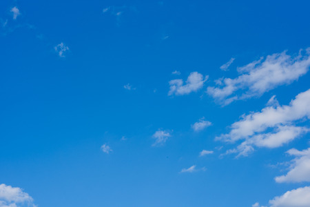 Blue sky background with clouds. Wallpaper.の写真素材