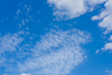 Blue sky background with clouds. Wallpaper.の写真素材