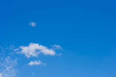 Blue sky background with clouds. Wallpaper.の写真素材