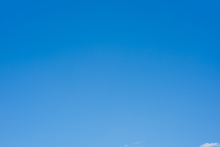 Blue sky background with clouds. Wallpaper.の写真素材