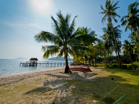 Fishing boats on the beach of Koh Chang, Thailand.の写真素材