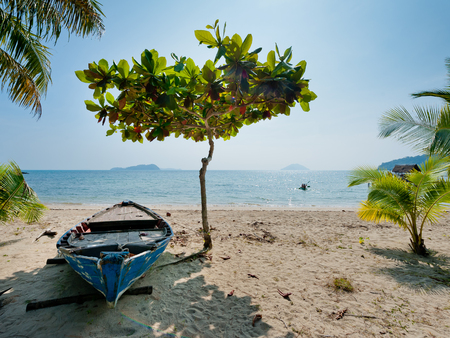 Fishing boats on the beach of Koh Chang, Thailand.の写真素材