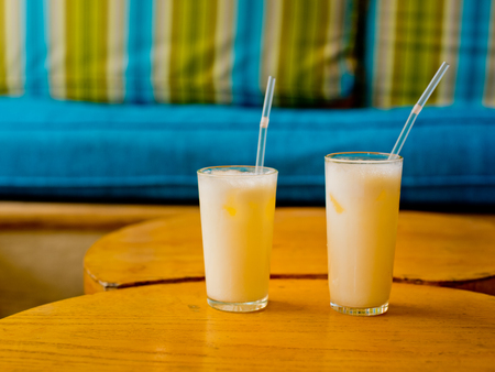 Two glasses with cocktail pina colada.の写真素材