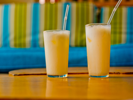 Two glasses with cocktail pina colada.の写真素材