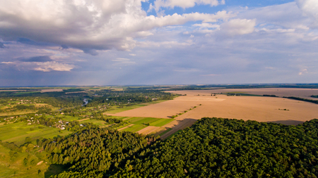 Aerial view of fields, forest, river, a beautiful landscape of nature.の写真素材