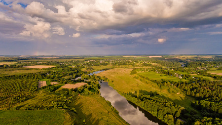 Aerial view of fields, forest, river, a beautiful landscape of nature.の写真素材