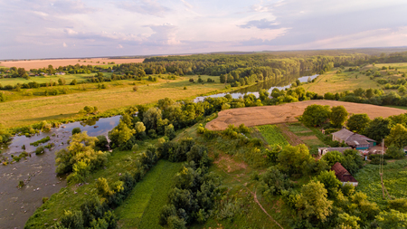 Aerial view of fields, forest, river, a beautiful landscape of nature.の写真素材