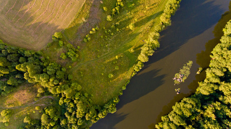 Aerial view of fields, forest, river, a beautiful landscape of nature.の写真素材