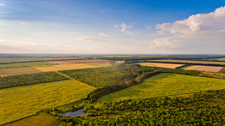 Aerial view of fields, forest, river, a beautiful landscape of nature.の写真素材