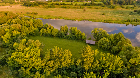 Aerial view of fields, forest, river, a beautiful landscape of nature.の写真素材