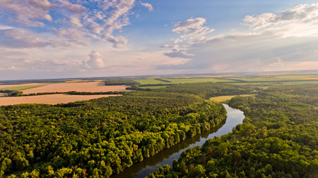 Aerial view of fields, forest, river, a beautiful landscape of nature.の写真素材