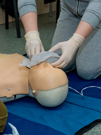 First aid cardiopulmonary resuscitation course using automated external defibrillator device, AED.の写真素材