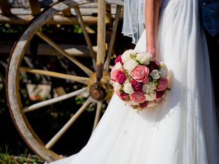 Wedding bouquet in the hands of the bride.の写真素材
