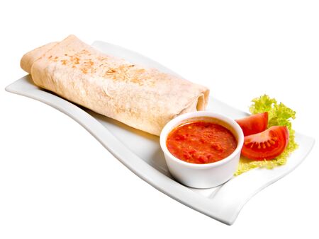 Eastern traditional shawarma plate with sauce isolated on white.の写真素材